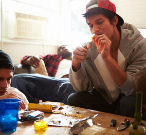 Editorial Image Yong men taking heavy drugs