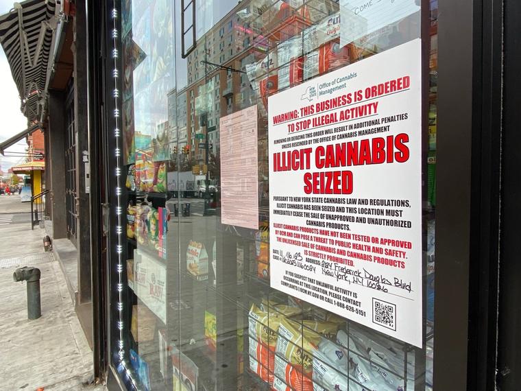 Police sign on a store: Illicit Cannabis Seized