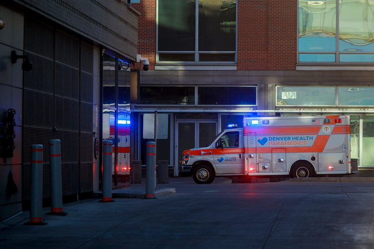Denver ambulance by a hospital