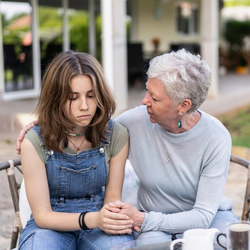 Grandmother talks to teenage girl