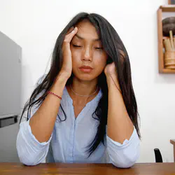 Woman with migraine