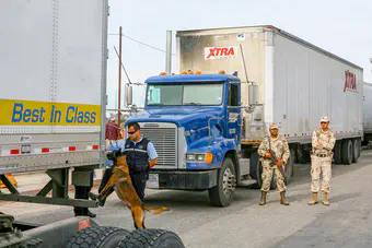 Border Guards checking for drug shipments on the California/Mexico border